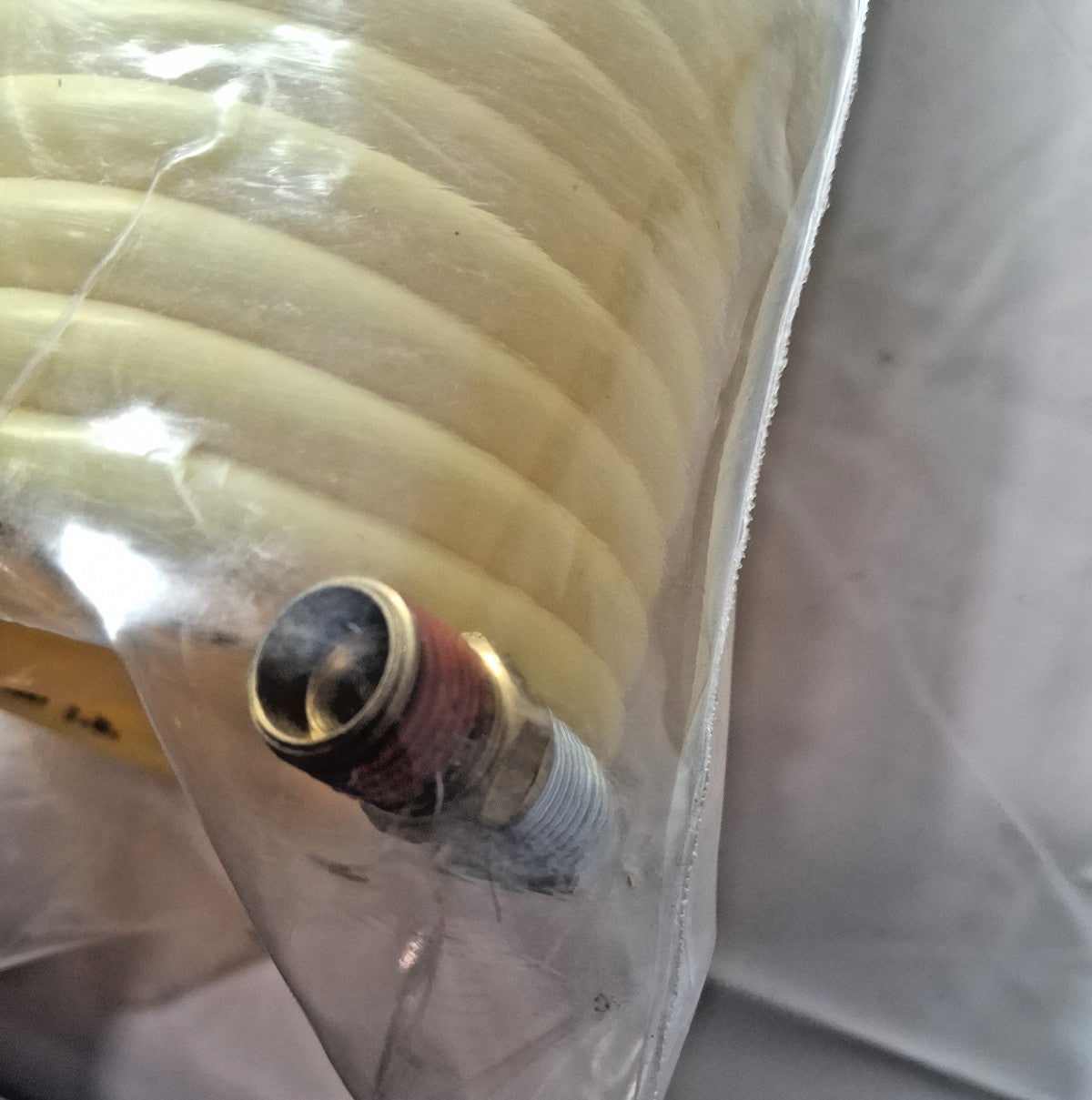 Coilhose Pneumatics Male SwivelCoiled & Self Storing Hose 25' Long N14-25B