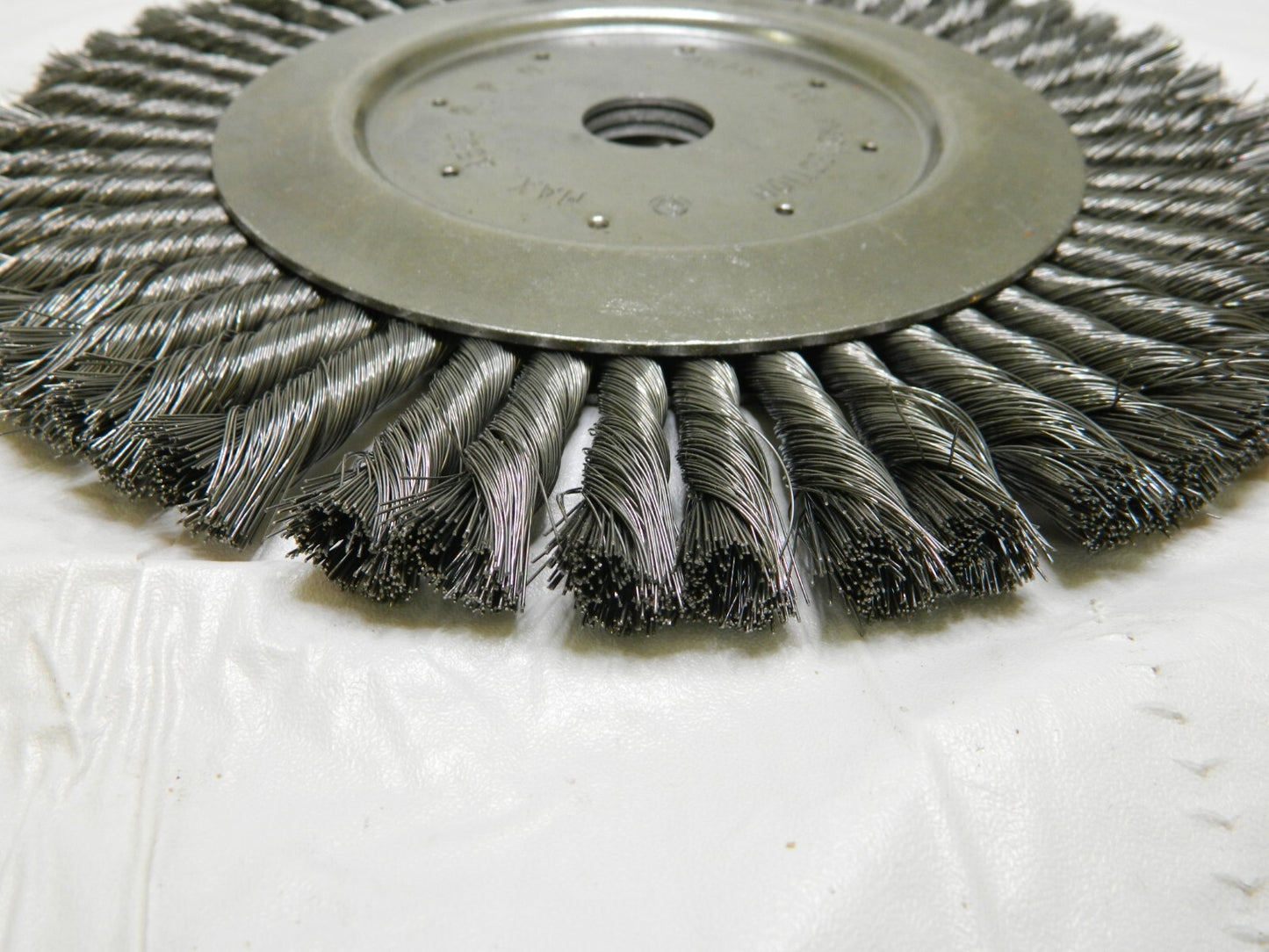 Wheel Brush: 10″ Wheel Dia, Knotted 1″ Hole, Steel, 4,500 RPM 00652081