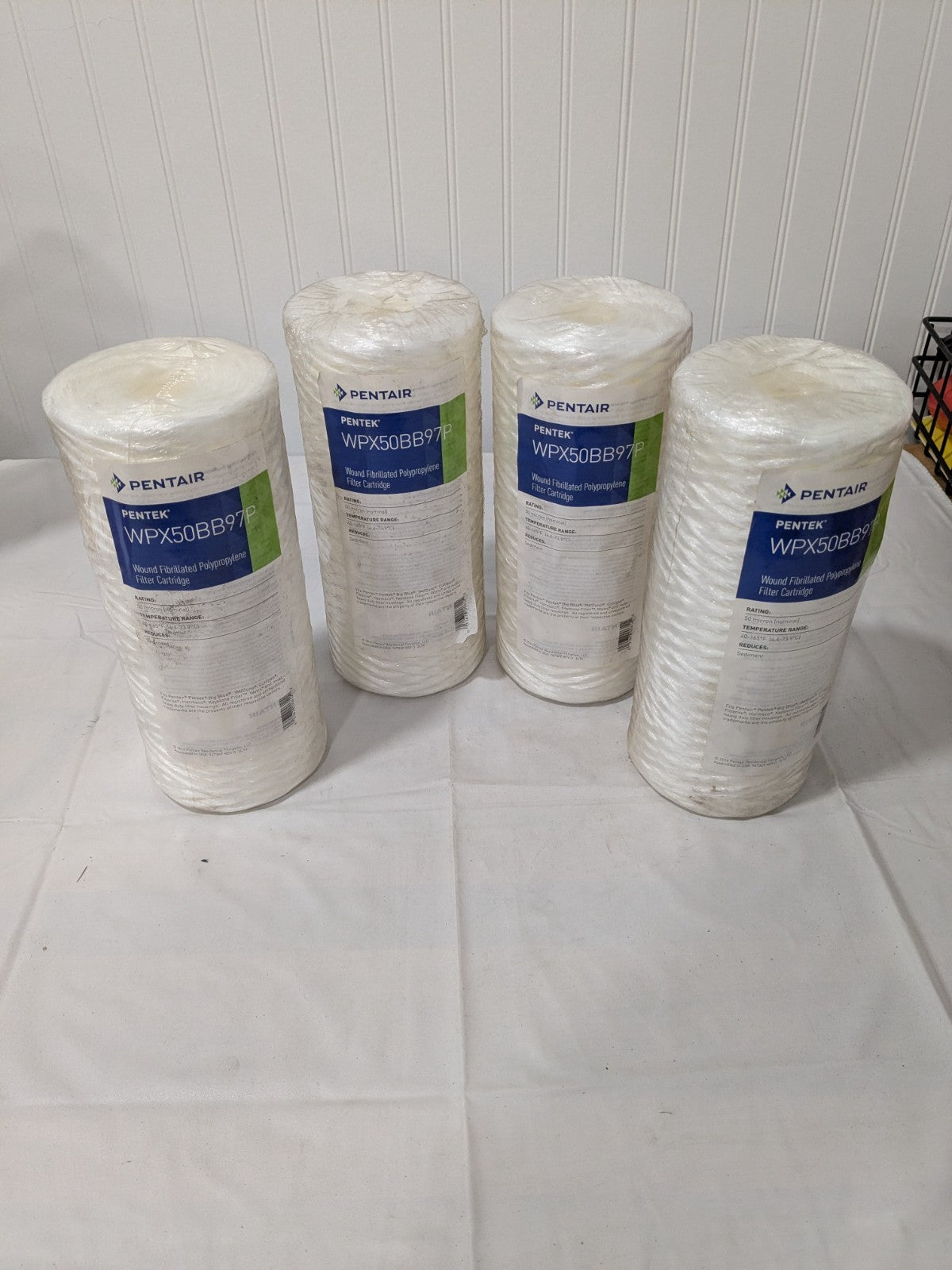 (4) Pentair Water Cartridge Filter: 4-1/2" OD, 9-7/8" L, 50 micron WPX50BB97P
