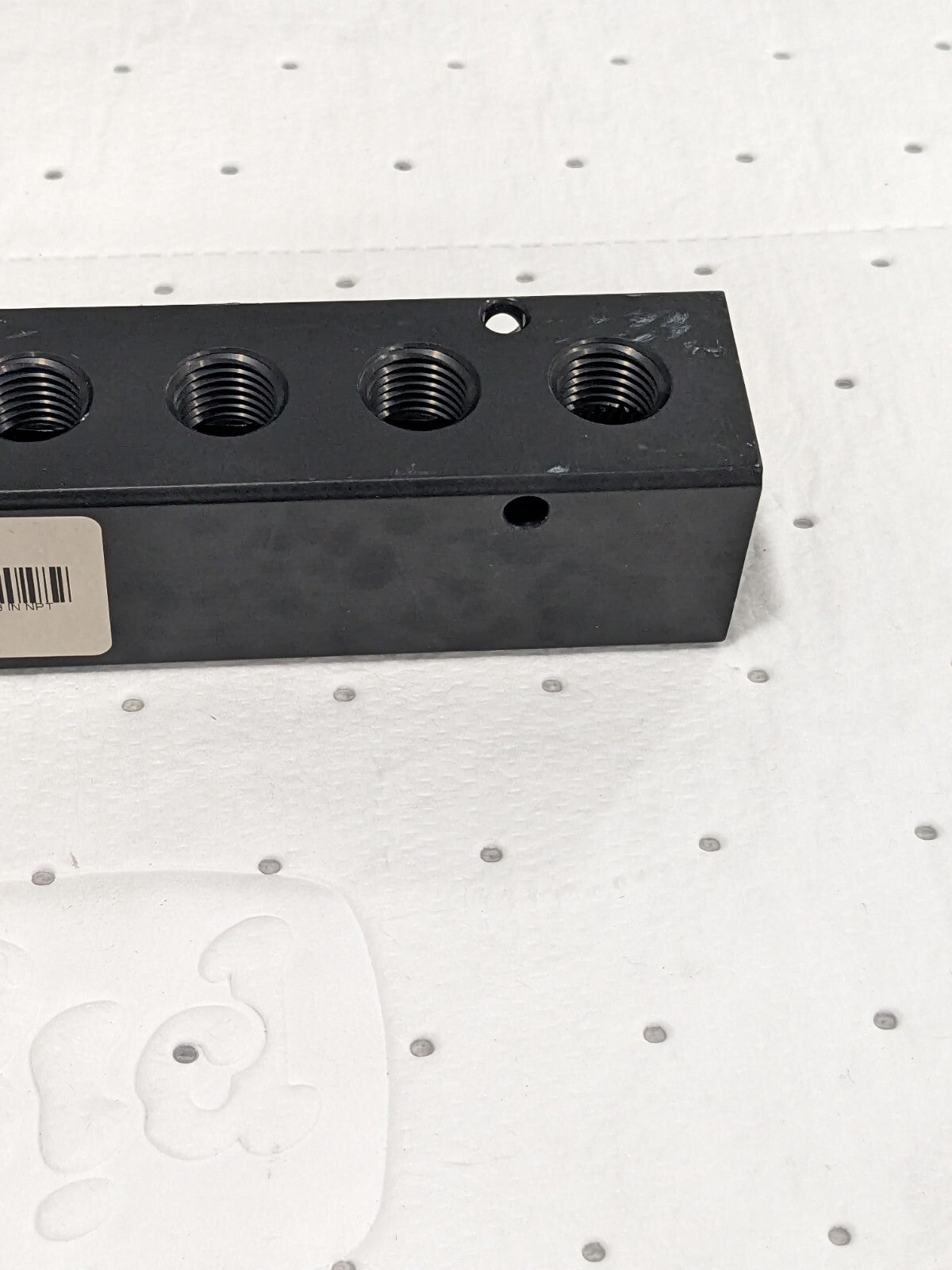 Manifold: 3/8" Inlet, 1/4" Outlet, 2 Inlet Ports, 8 Outlet Ports PCM20-250-08B