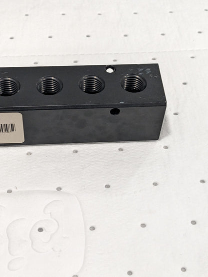 Manifold: 3/8" Inlet, 1/4" Outlet, 2 Inlet Ports, 8 Outlet Ports PCM20-250-08B