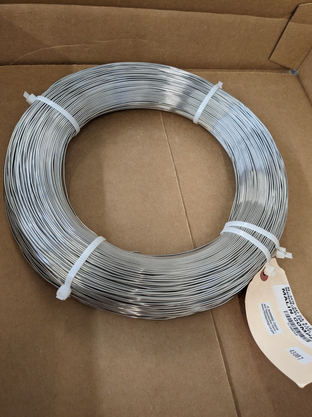 Spring Wire Coil: 302 Stainless Steel, 0.047" Dia, 1,008' Long 32-0470-006C
