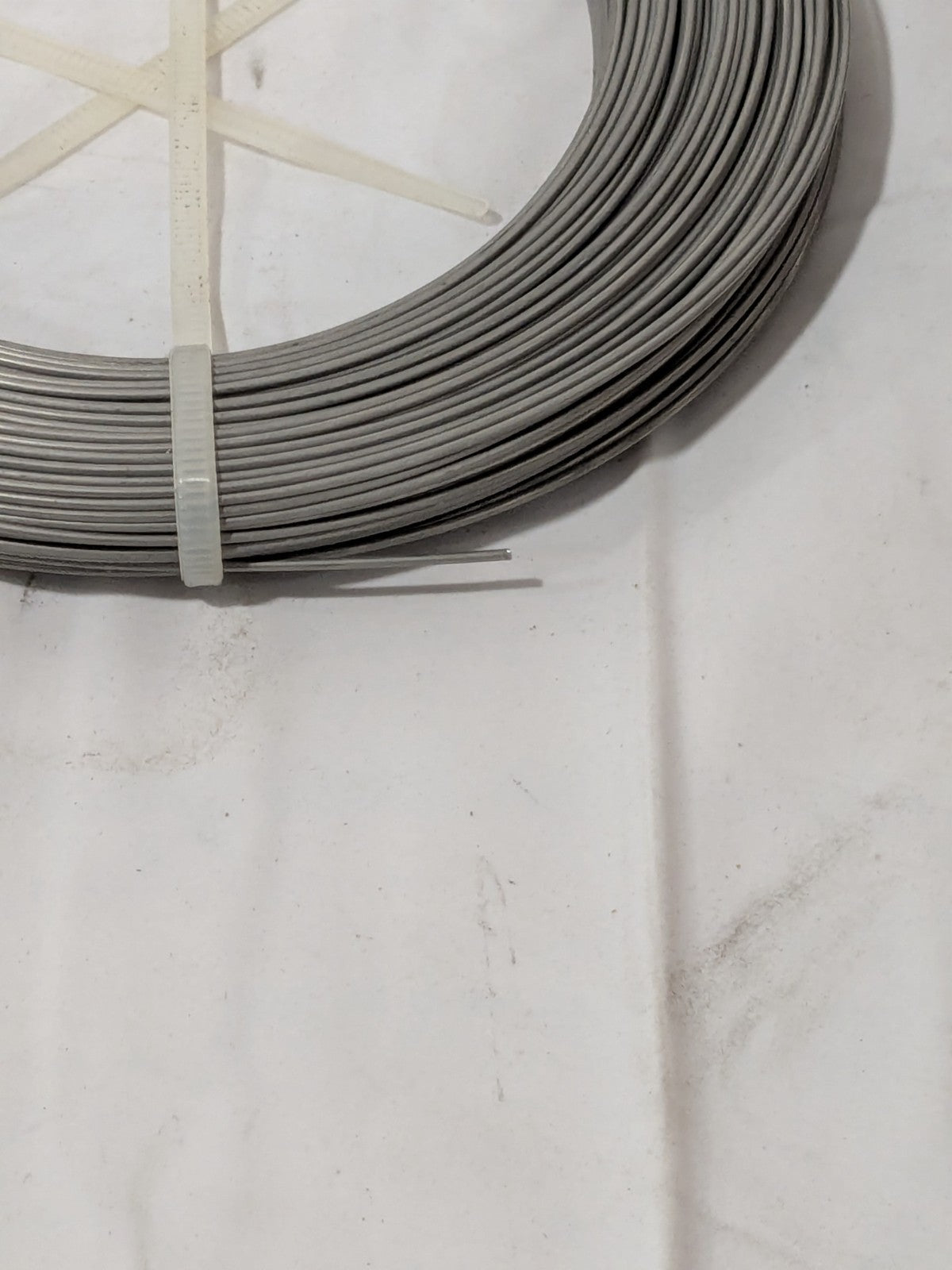 TBI Music Wire Coil: 302 & 304 Stainless Steel, 0.041" Dia, 223' Long M-SMW-41