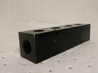 PRO Outlet Manifold 3/8 x 1/2 x 6 1/4 2 Inlet 4 Outlet 06429500